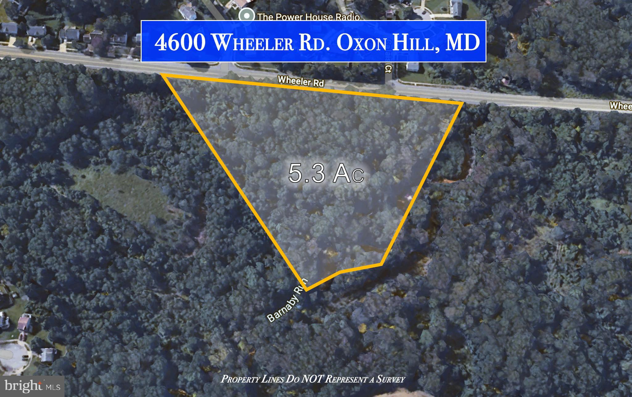 4600 Wheeler Road Oxon Hill, MD 20745 - Photo 6 of 9 a view of outdoor space with signage and flags