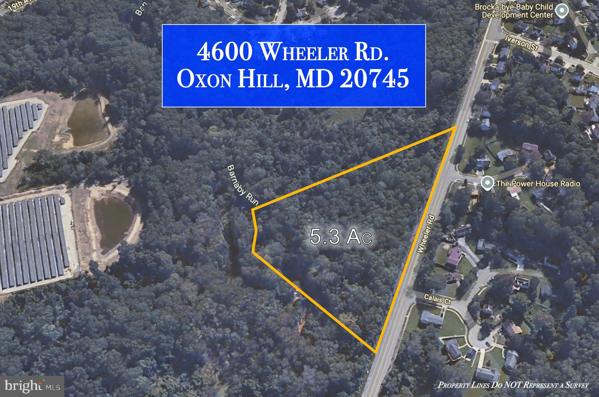 4600 Wheeler Road Oxon Hill, MD 20745 - Photo 7 of 9 a sign on the side of the road