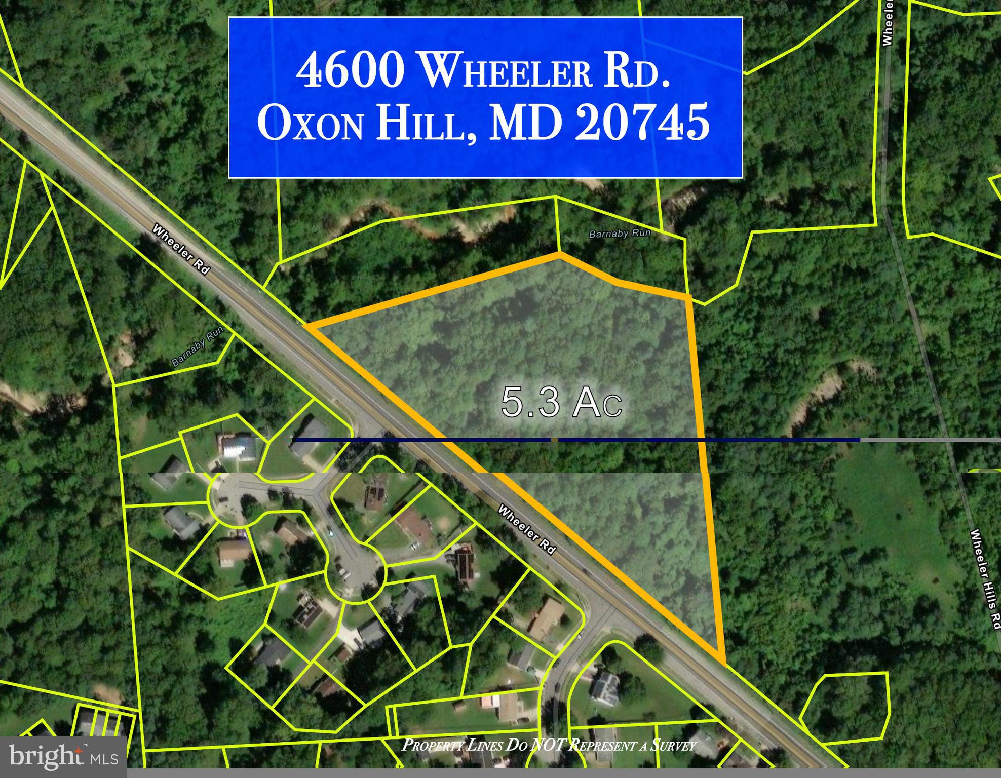 4600 Wheeler Road Oxon Hill, MD 20745 - Photo 9 of 9 a sign on the side of the street