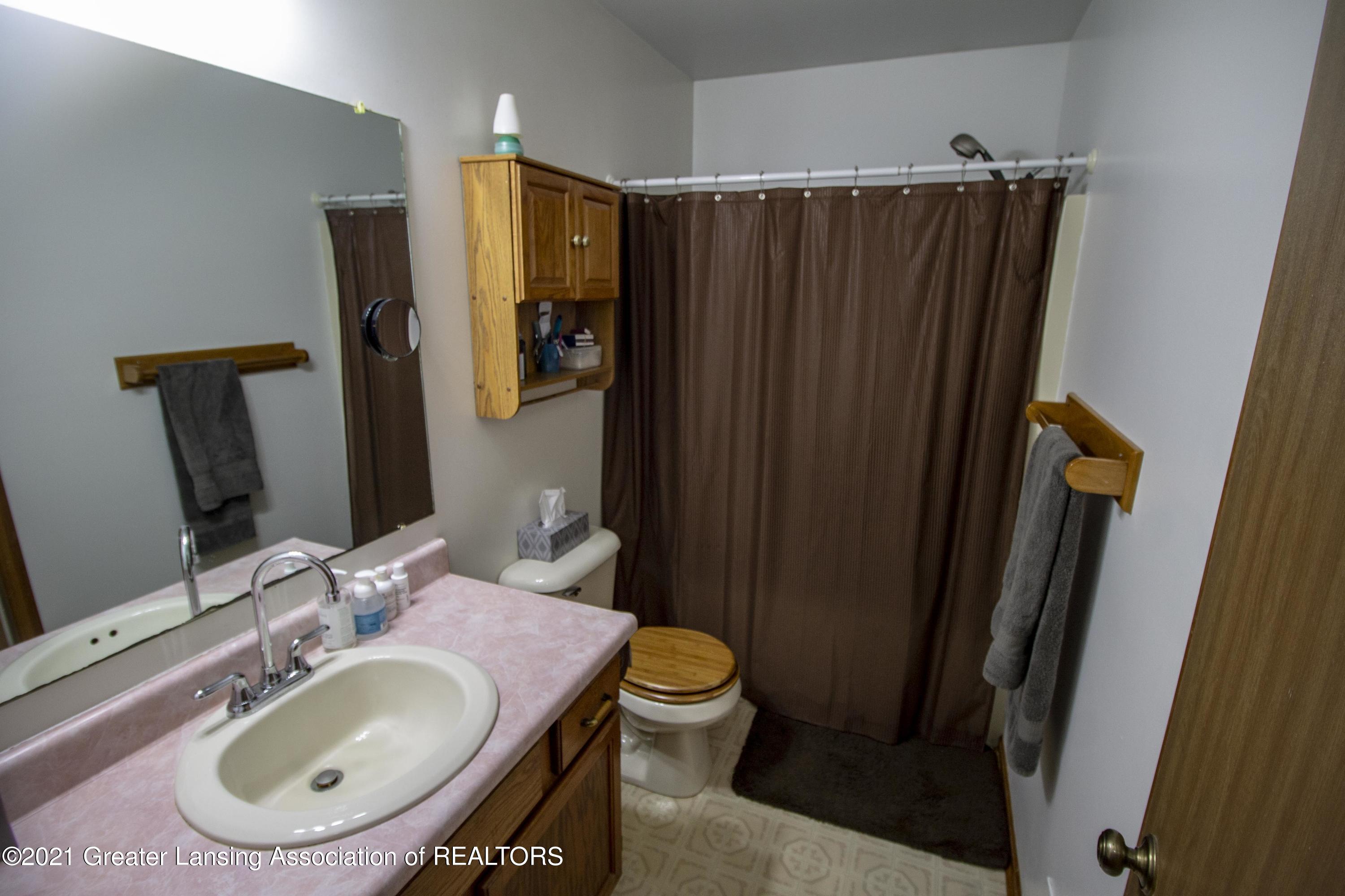 6868 North Cochran Road Charlotte, MI 48813 - Photo 13 of 35 cochran bathroom