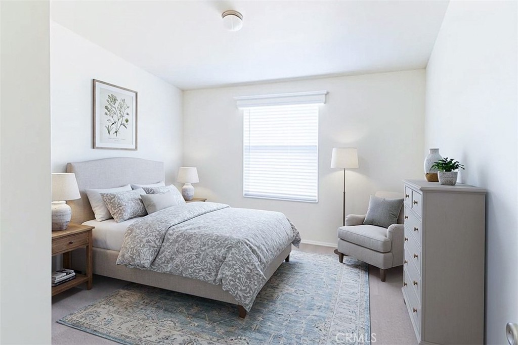 40104 Walcott Lane Temecula, CA 92591 - Photo 20 of 41 a bedroom with a bed and a couch