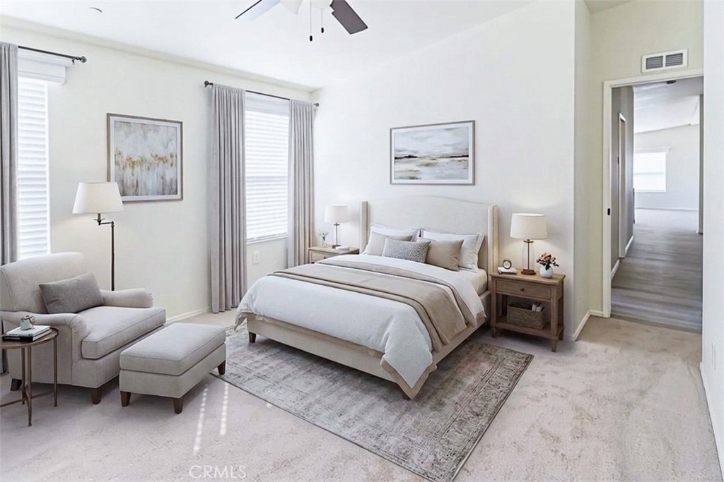 40104 Walcott Lane Temecula, CA 92591 - Photo 27 of 41 a bedroom with a bed and wooden floor