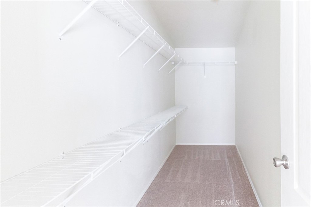 40104 Walcott Lane Temecula, CA 92591 - Photo 30 of 41 a view of a hallway with white walls