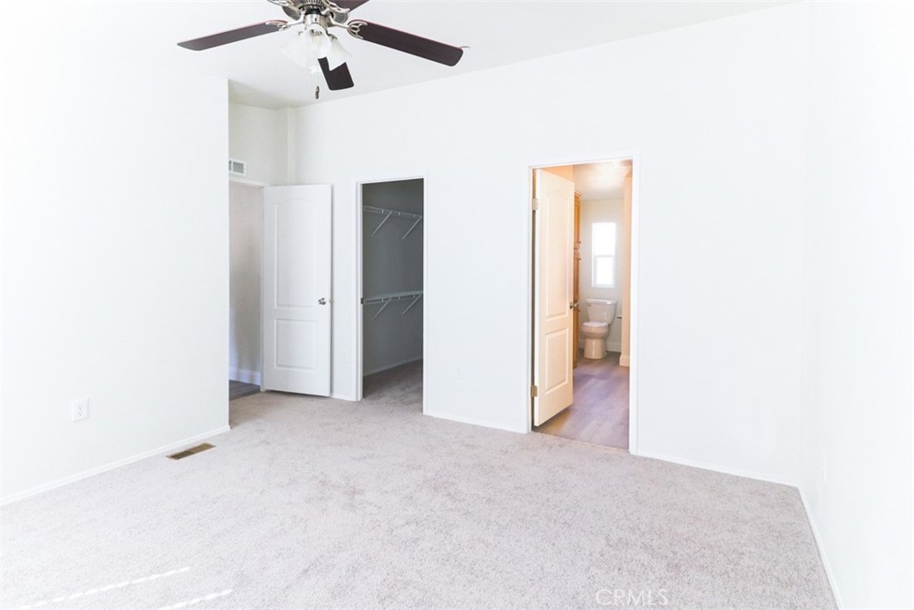 40104 Walcott Lane Temecula, CA 92591 - Photo 36 of 41 a view of a livingroom with a ceiling fan