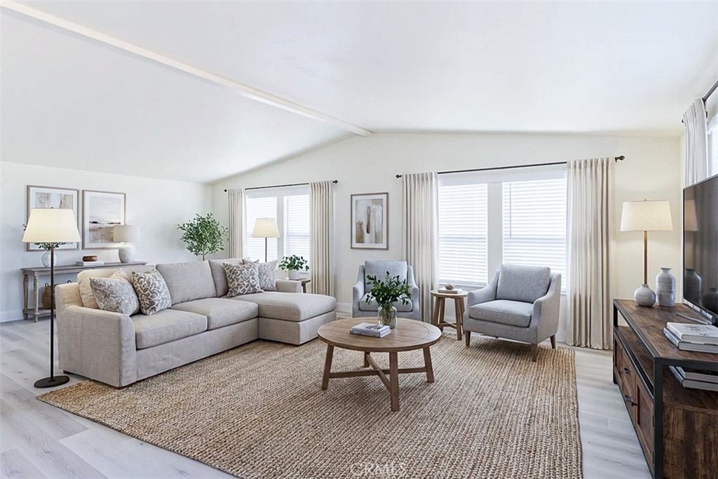 40104 Walcott Lane Temecula, CA 92591 - Photo 4 of 41 a living room with furniture wooden floor and a large window