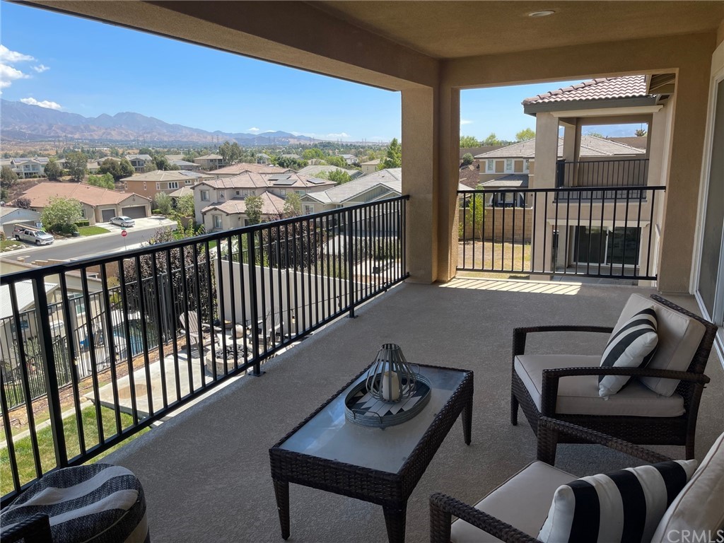 35334 Thorpe Trail Beaumont, CA 92223 - Photo 1 of 74 a view of a city from a balcony with furniture