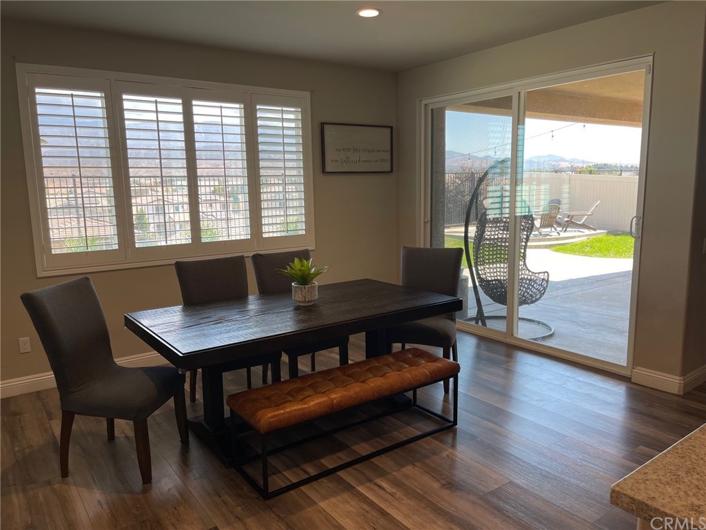 35334 Thorpe Trail Beaumont, CA 92223 - Photo 15 of 74 a living room with furniture and a wooden floor