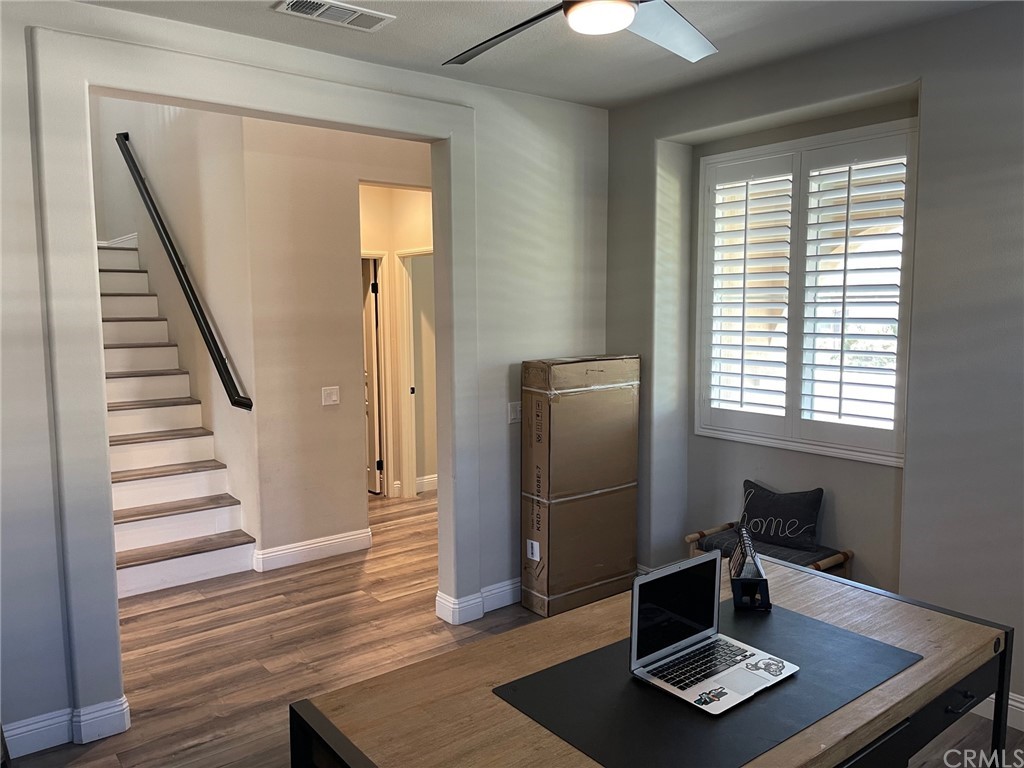 35334 Thorpe Trail Beaumont, CA 92223 - Photo 24 of 74 a view of a workspace with furniture and a window