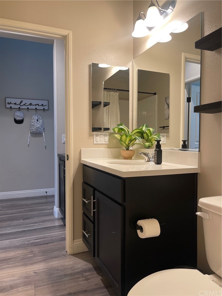 35334 Thorpe Trail Beaumont, CA 92223 - Photo 27 of 74 a bathroom with a sink vanity granite and toilet