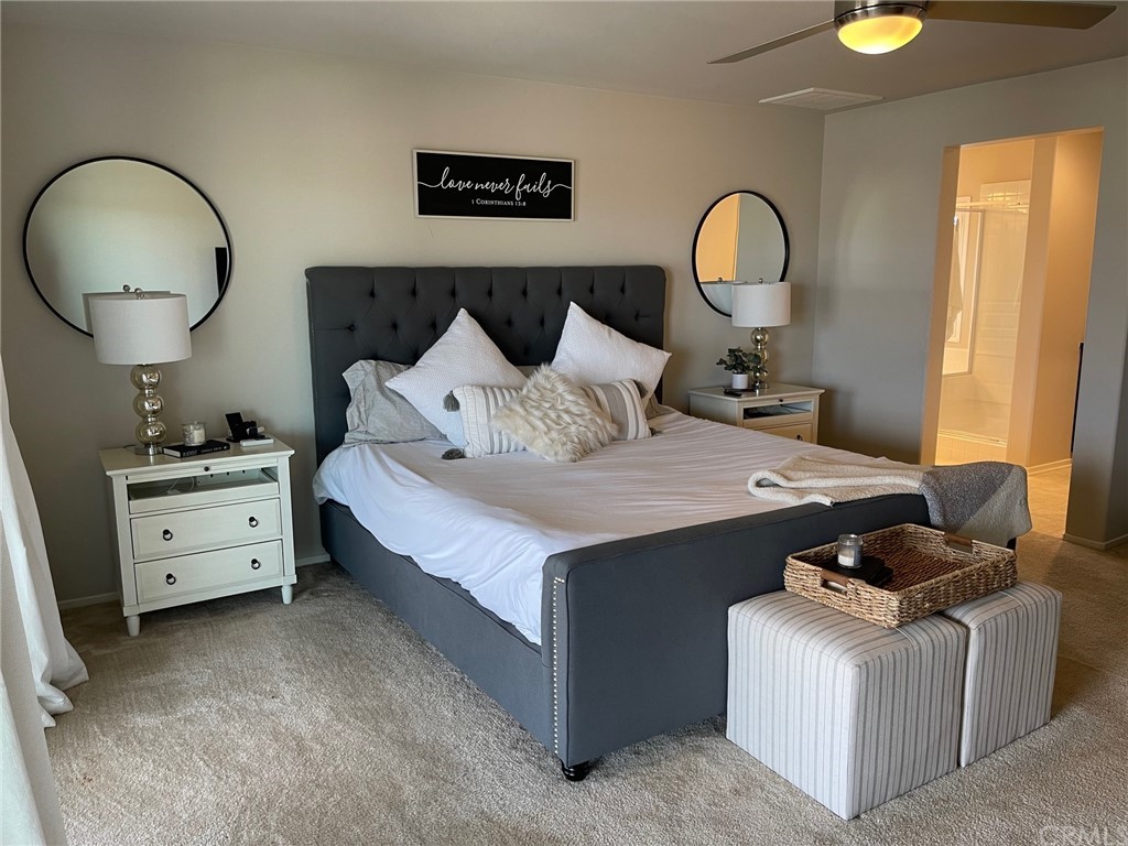 35334 Thorpe Trail Beaumont, CA 92223 - Photo 39 of 74 a bed room with a bed and a dresser