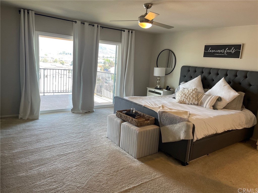 35334 Thorpe Trail Beaumont, CA 92223 - Photo 40 of 74 a bedroom with bed and a large window