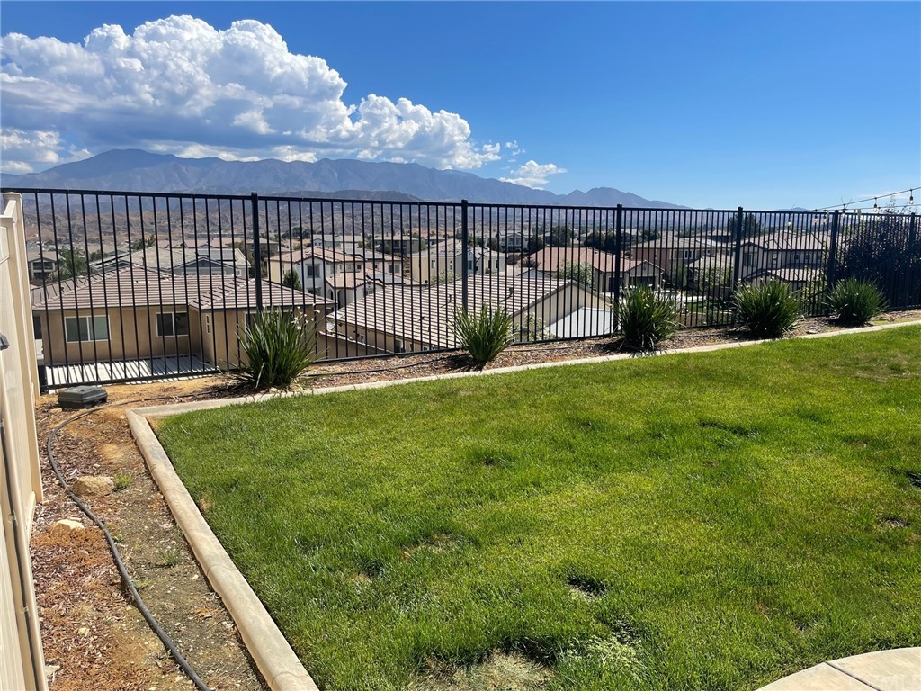 35334 Thorpe Trail Beaumont, CA 92223 - Photo 67 of 74 a view of a backyard with a garden