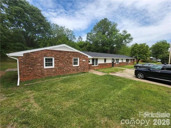 a house view with a garden space