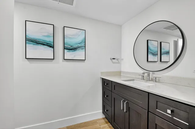 a view of a hallway with washer and dryer