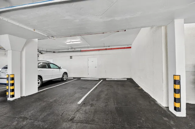 a view of a swimming pool and a yard