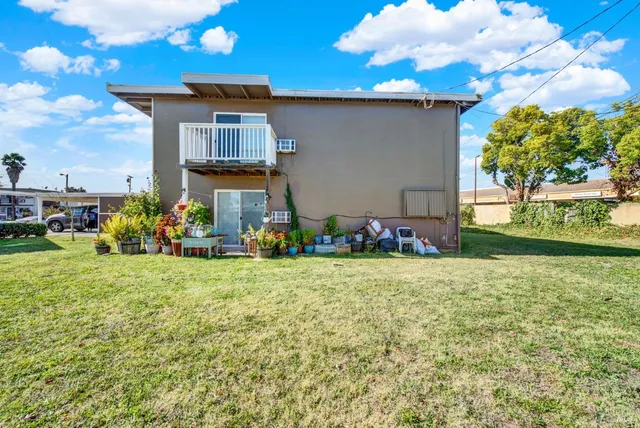a backyard of a house with lots of green space