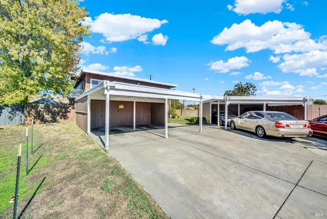 a house view with a garden space