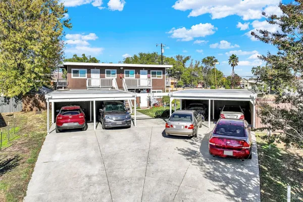 a car parked in front of a house
