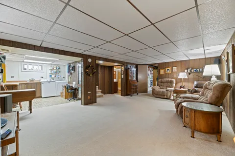 a large room with furniture and a large window