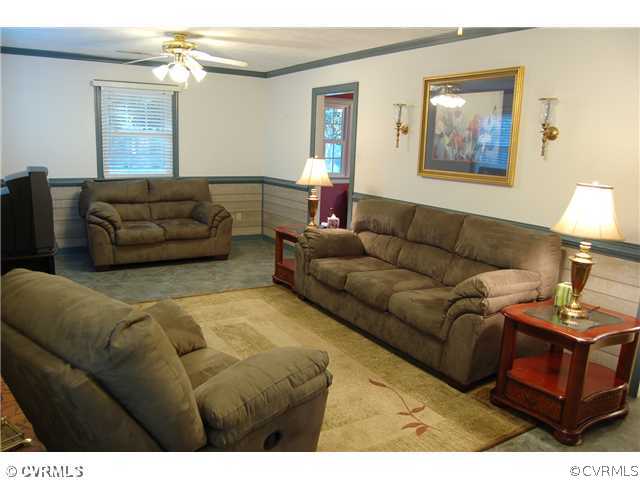 8100 Winterpock Road Chesterfield, VA 23832 - Photo 3 of 21 a living room with furniture and a couch