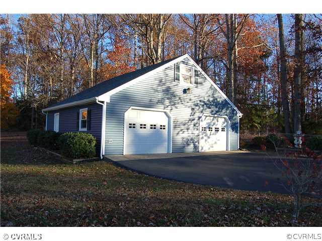 8100 Winterpock Road Chesterfield, VA 23832 - Photo 10 of 21 a view of a house with a yard