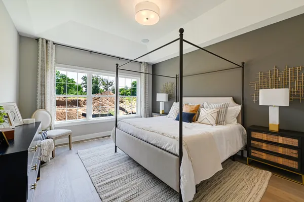 a bed room with a bed and a couch