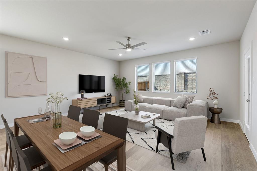 1148 Del Rio Drive Lavon, TX 75166 - Photo 14 of 35 Living Room in the Holden home plan by Trophy Signature Homes – REPRESENTATIVE PHOTO