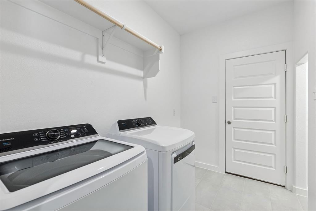 1148 Del Rio Drive Lavon, TX 75166 - Photo 18 of 35 Utility Room in the Holden home plan by Trophy Signature Homes – REPRESENTATIVE PHOTO