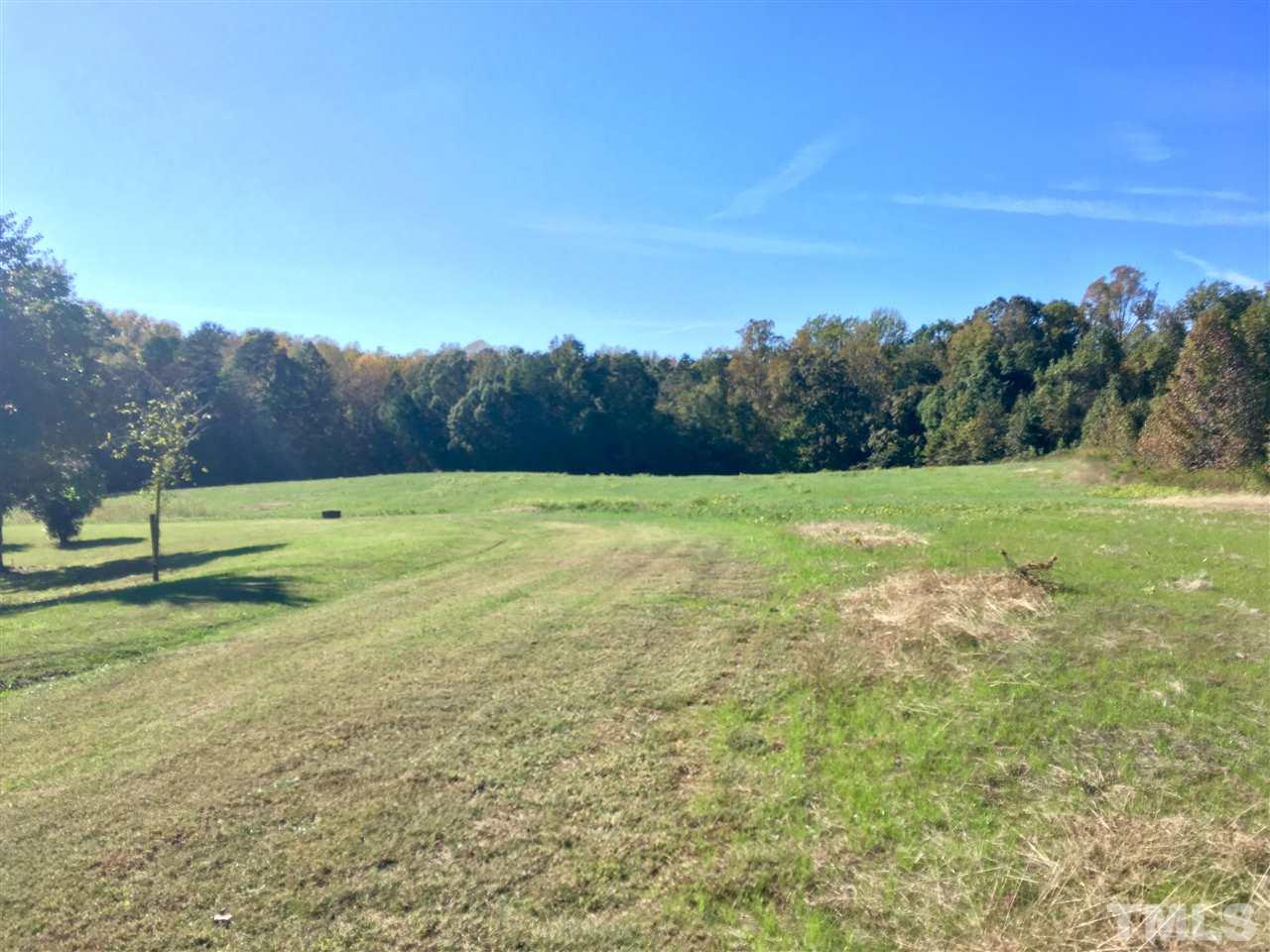 15.93-acre Country Club Road Roxboro, NC 27574 - Photo 3 of 4 a view of a field with an ocean