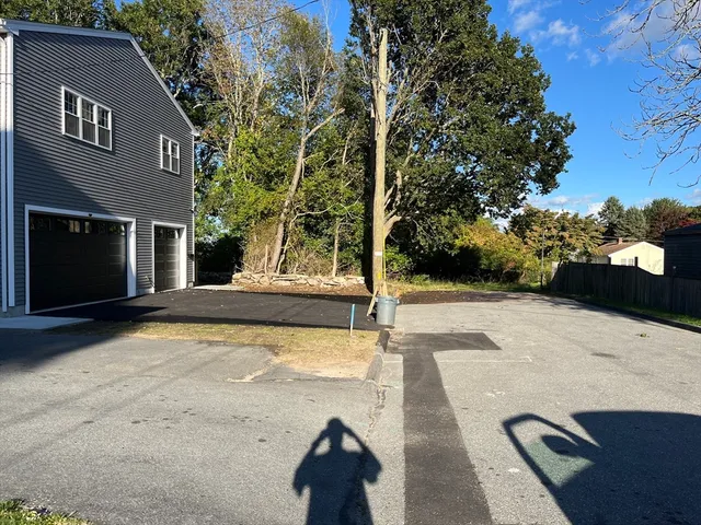 a view of a back yard of the house