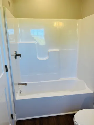 a bathroom with a sink and a bathtub