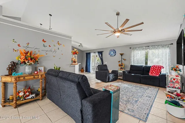 a living room with furniture and a couch