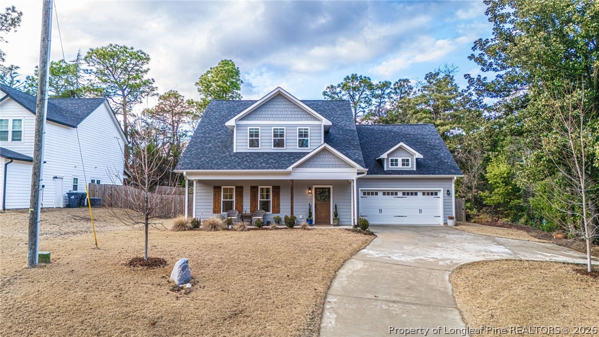 480 Clark Street Southern Pines, NC 28387 - Photo 1 of 28 a front view of a house with a yard