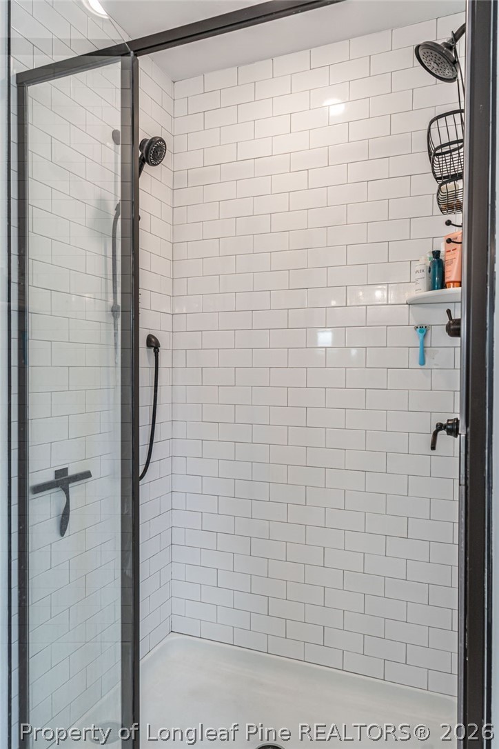 480 Clark Street Southern Pines, NC 28387 - Photo 23 of 28 a bathroom with a shower