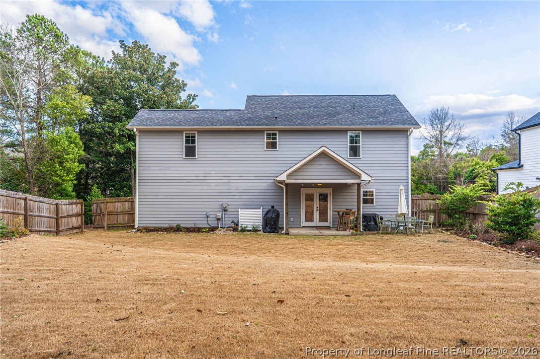 480 Clark Street Southern Pines, NC 28387 - Photo 25 of 28 a front view of a house with a yard
