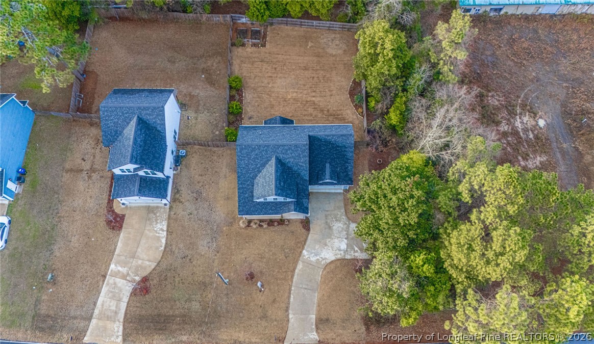 480 Clark Street Southern Pines, NC 28387 - Photo 27 of 28 an aerial view of a house with a yard and plants