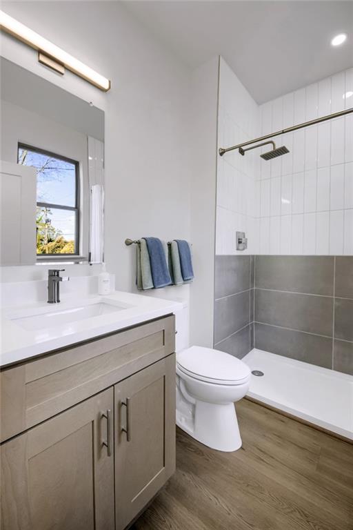 1070 Dill Avenue Southwest, Unit 306 Atlanta, GA 30310 - Photo 12 of 17 a bathroom with a sink a toilet and shower