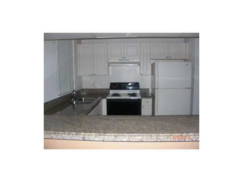 6854 West Sample Road, Unit B30 Coral Springs, FL 33067 - Photo 1 of 8 Exterior Front