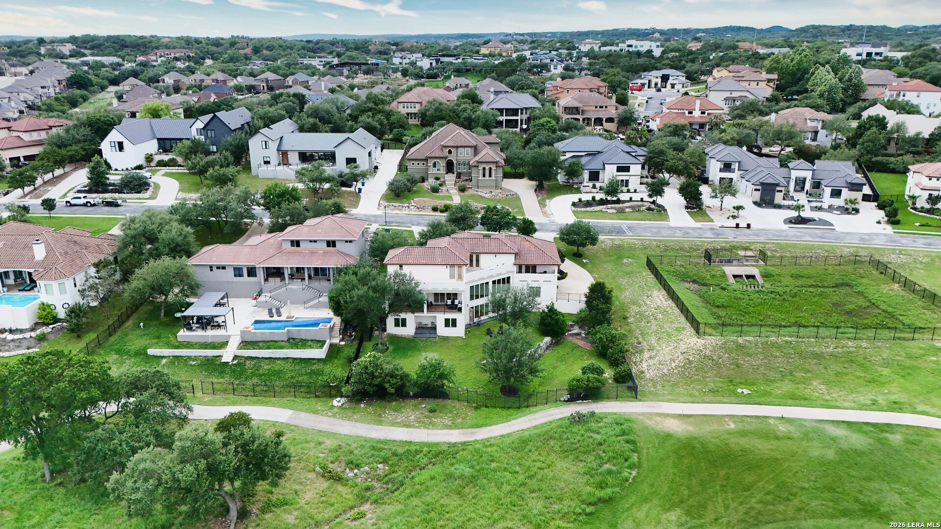 426 Legacy Ridge San Antonio, TX 78258 - Photo 38 of 38 an aerial view of residential houses with outdoor space and street view