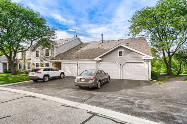 a car parked in front of a house