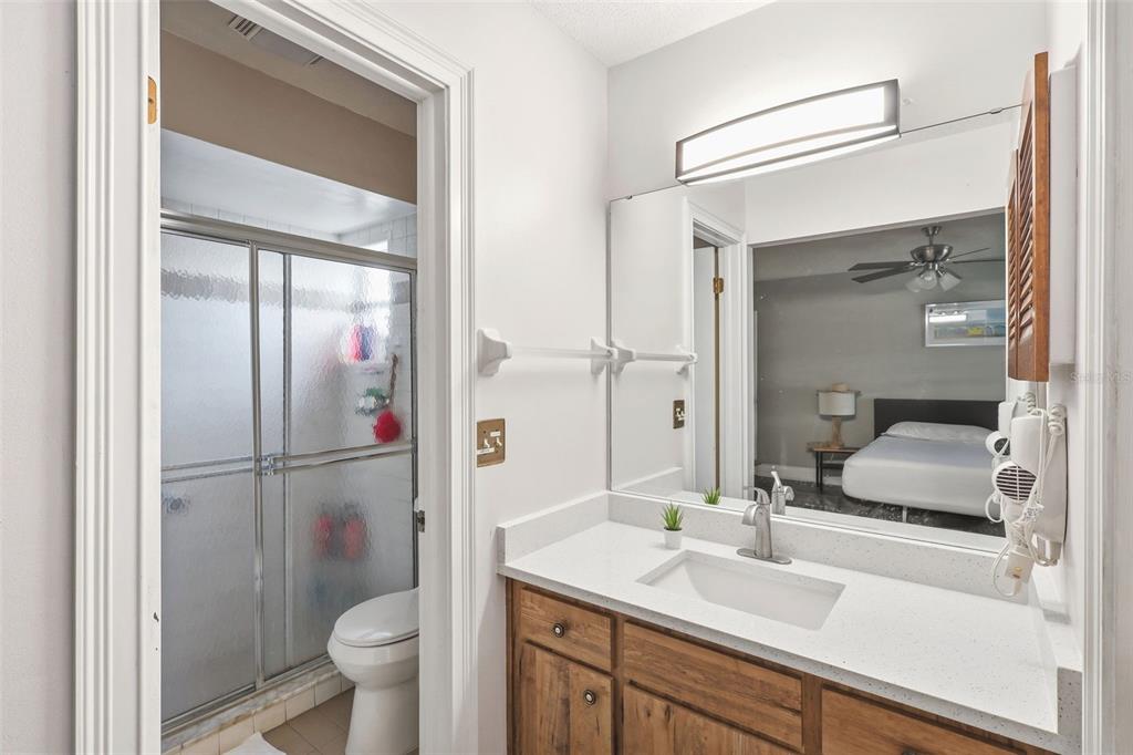 244 Angeles Road DeBary, FL 32713 - Photo 24 of 41 a bathroom with a sink toilet and shower