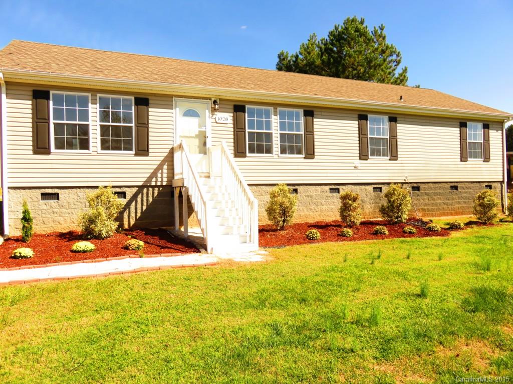 1028 Tot Dellinger Road Cherryville, NC 28021 - Photo 2 of 21 a view of a house with a patio