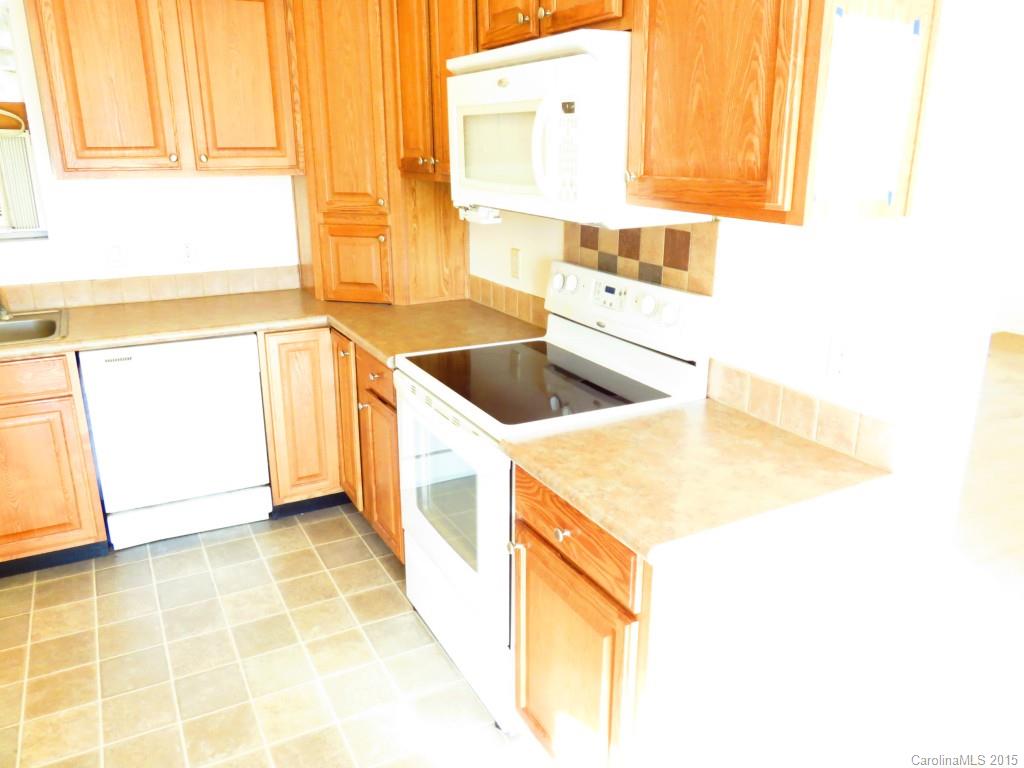 1028 Tot Dellinger Road Cherryville, NC 28021 - Photo 11 of 21 a view of a kitchen with a sink and a dishwasher