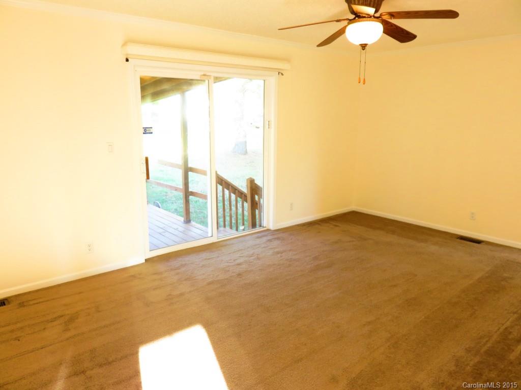 1028 Tot Dellinger Road Cherryville, NC 28021 - Photo 13 of 21 a view of empty room with a ceiling fan