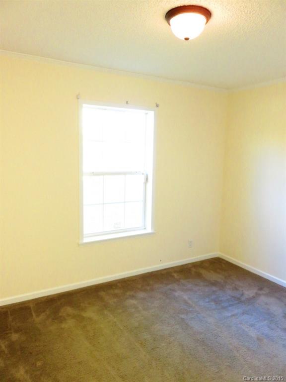 1028 Tot Dellinger Road Cherryville, NC 28021 - Photo 15 of 21 an empty room with a window
