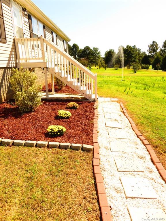 1028 Tot Dellinger Road Cherryville, NC 28021 - Photo 3 of 21 a view of an ocean with palm trees