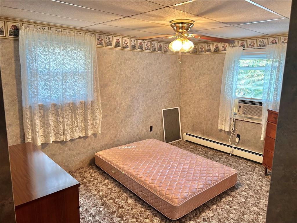 562 Smith Run Road Amity, PA 15311 - Photo 17 of 26 a bedroom with a bed and a window