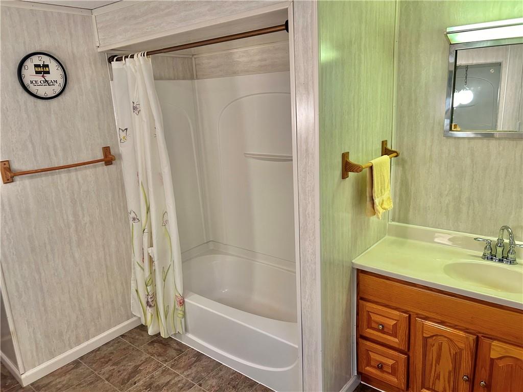 562 Smith Run Road Amity, PA 15311 - Photo 19 of 26 a bathroom with a shower a sink and a mirror