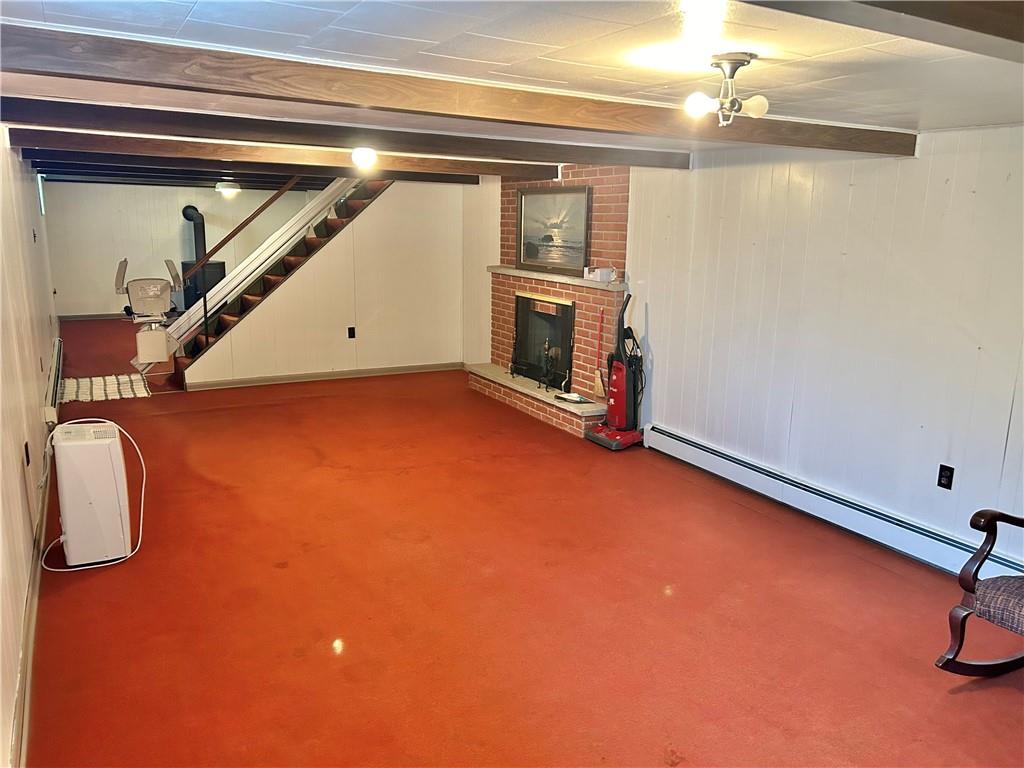 562 Smith Run Road Amity, PA 15311 - Photo 21 of 26 a view of a livingroom with an entryway and a fireplace