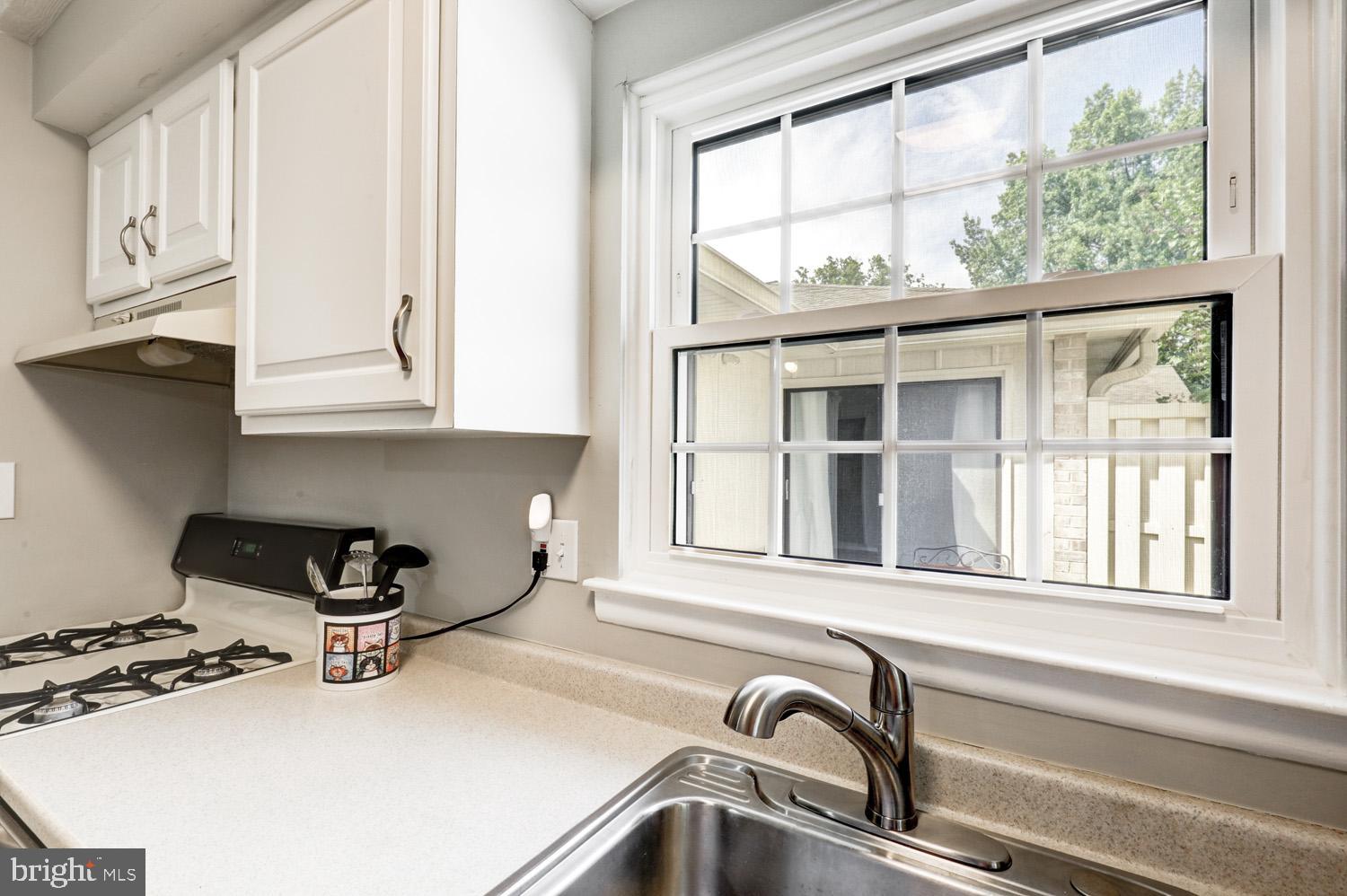 425 Valleybrook Drive Lancaster, PA 17601 - Photo 9 of 50 a kitchen with a sink cabinets and a window